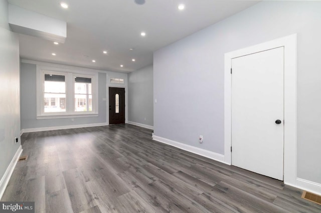 4605 N 13th St, Philadelphia, PA 19140 - unfurnished living room with wood finished floors, baseboards, and recessed lighting