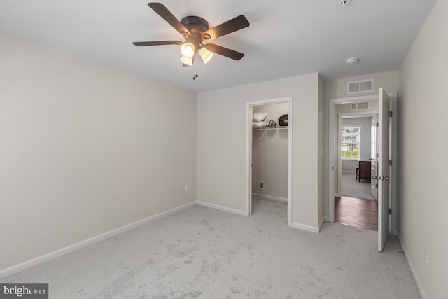 9909 Kildore Way, Fort Washington, MD 20744 - unfurnished bedroom with light colored carpet, baseboards, a spacious closet, and a closet
