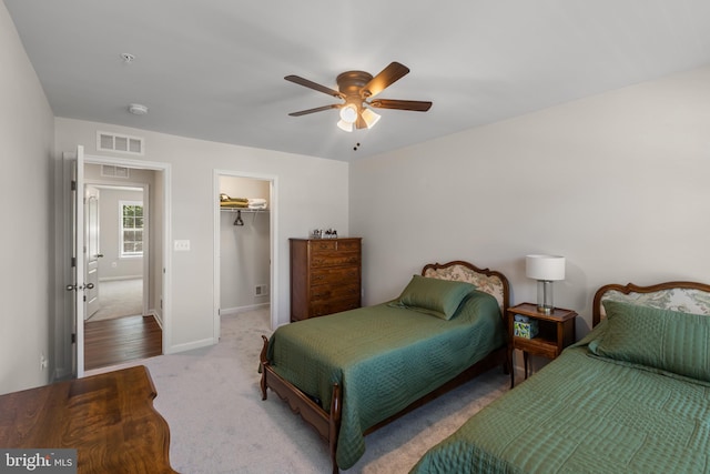 9909 Kildore Way, Fort Washington, MD 20744 - carpeted bedroom featuring a spacious closet, ceiling fan, a closet, and baseboards