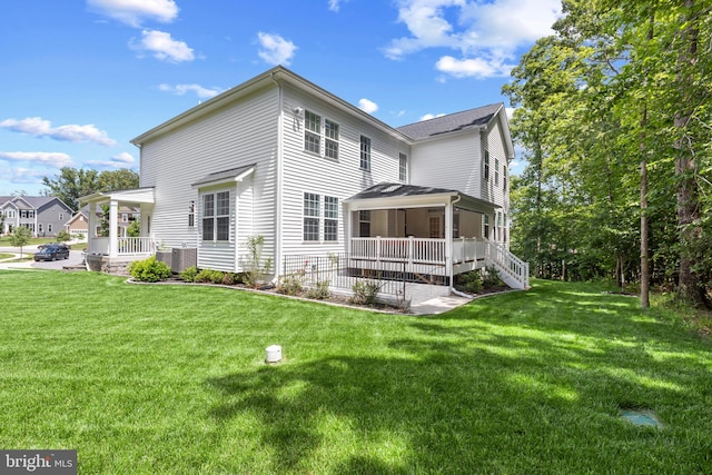 9909 Kildore Way, Fort Washington, MD 20744 - rear view of property with a lawn, a porch, and cooling unit