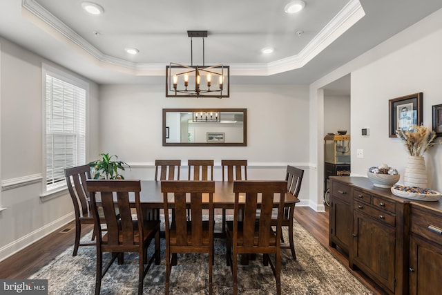 9909 Kildore Way, Fort Washington, MD 20744 - dining area with a tray ceiling, dark wood finished floors, ornamental molding, a chandelier, and baseboards