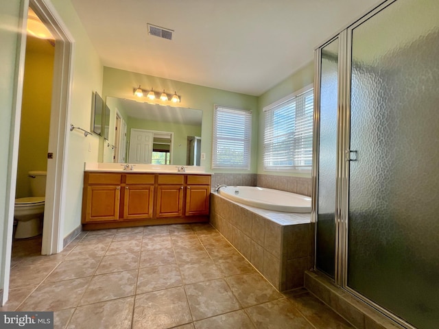 614 Wolfe Reserve Way, Harwood, MD 20776 - bathroom with double vanity, a garden tub, a shower stall, and toilet