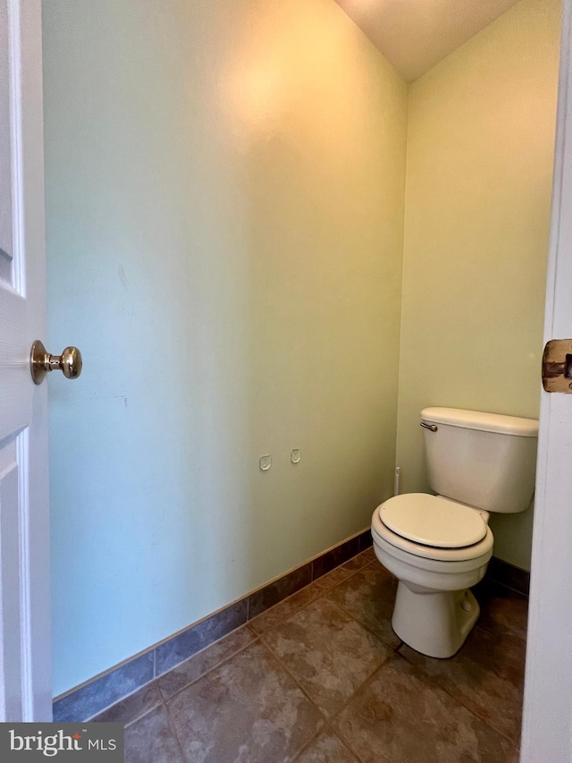 614 Wolfe Reserve Way, Harwood, MD 20776 - bathroom with toilet, baseboards, and tile patterned floors