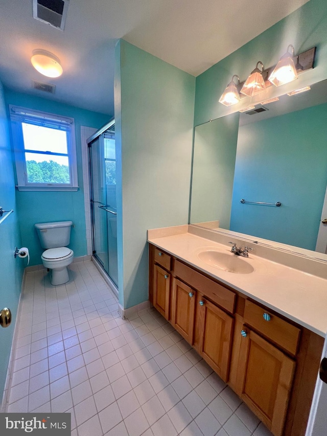 614 Wolfe Reserve Way, Harwood, MD 20776 - bathroom featuring toilet, tile patterned flooring, a stall shower, vanity, and baseboards