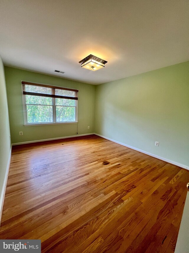 614 Wolfe Reserve Way, Harwood, MD 20776 - spare room with wood finished floors and baseboards