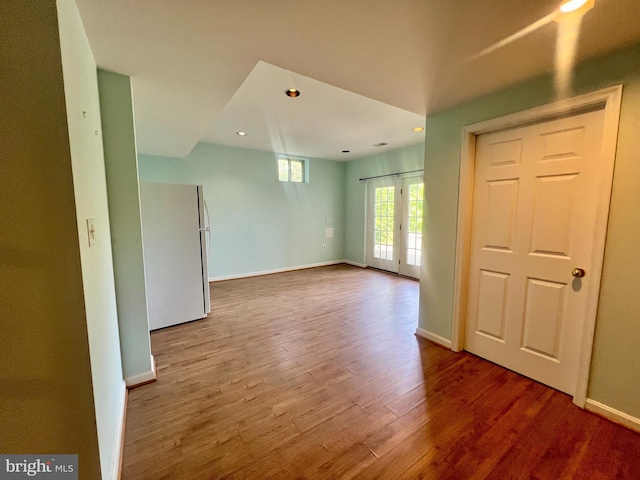 614 Wolfe Reserve Way, Harwood, MD 20776 - empty room with wood finished floors, baseboards, and recessed lighting