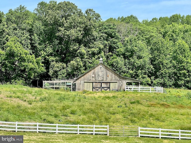 614 Wolfe Reserve Way, Harwood, MD 20776 - view of yard with a barn, an outbuilding, and a wooded view