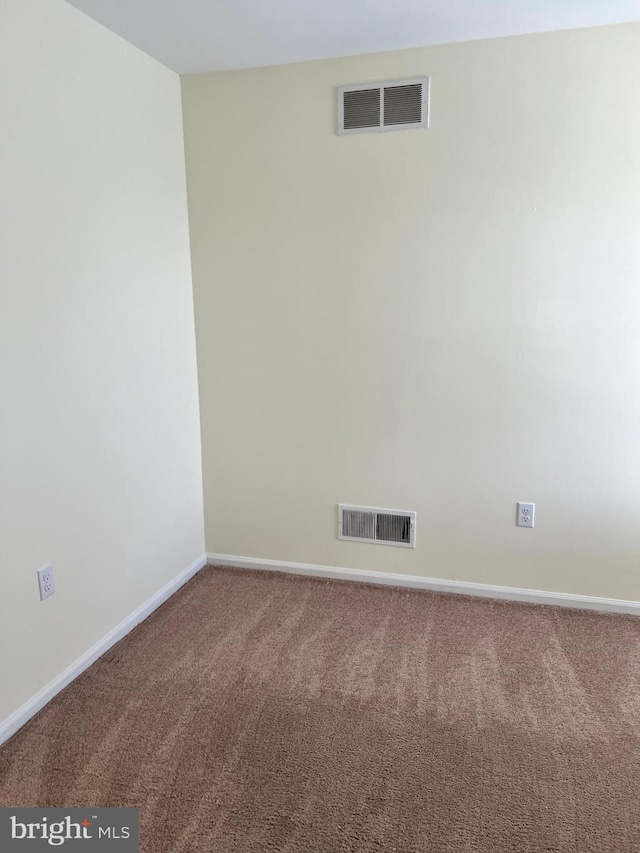 65 Auckland Dr, Newark, DE 19702 - carpeted empty room featuring baseboards