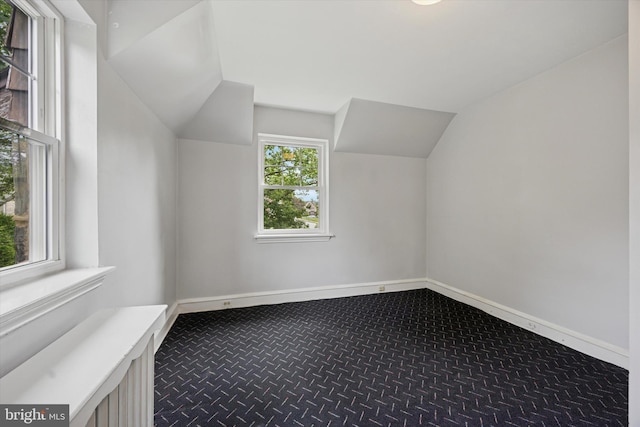 1100 Drexel Ave, Drexel Hill, PA 19026 - bonus room with lofted ceiling, dark carpet, and baseboards