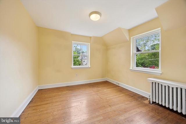 1100 Drexel Ave, Drexel Hill, PA 19026 - bonus room with radiator, hardwood / wood-style flooring, and baseboards