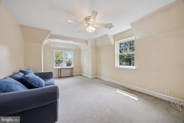1100 Drexel Ave, Drexel Hill, PA 19026 - living area featuring carpet flooring, a ceiling fan, baseboards, and vaulted ceiling