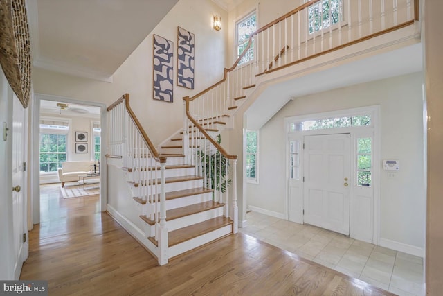 2053 Mayfair Mclean, Falls Church, VA 22043 - entryway featuring stairs, wood finished floors, healthy amount of natural light, baseboards, and a high ceiling
