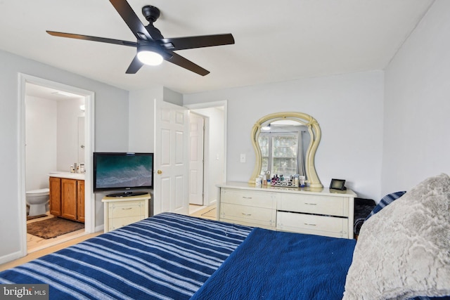 14617 Woodspring Ct, Centreville, VA 20120 - bedroom with connected bathroom, ceiling fan, and baseboards