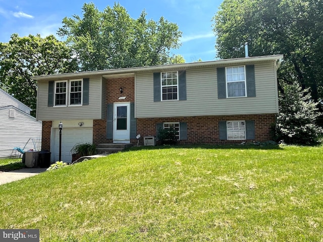 8661 Cooperhawk Ct, Columbia, MD 21045 - bi-level home featuring a garage, a front lawn, brick siding, and driveway