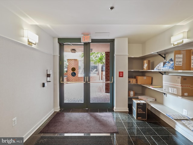 1045 N Utah St Unit 2-404, Arlington, VA 22201 - entrance foyer with baseboards, french doors, and granite tiled floors