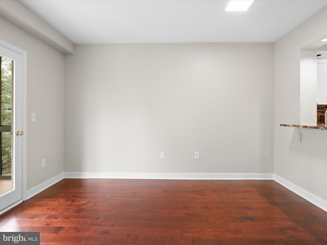1045 N Utah St Unit 2-404, Arlington, VA 22201 - unfurnished room featuring wood-type flooring and baseboards