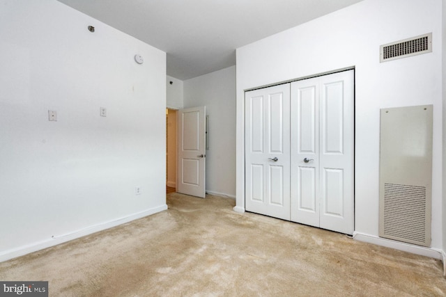 901 N Penn St Unit R305, Philadelphia, PA 19123 - unfurnished bedroom with carpet floors, a closet, and baseboards
