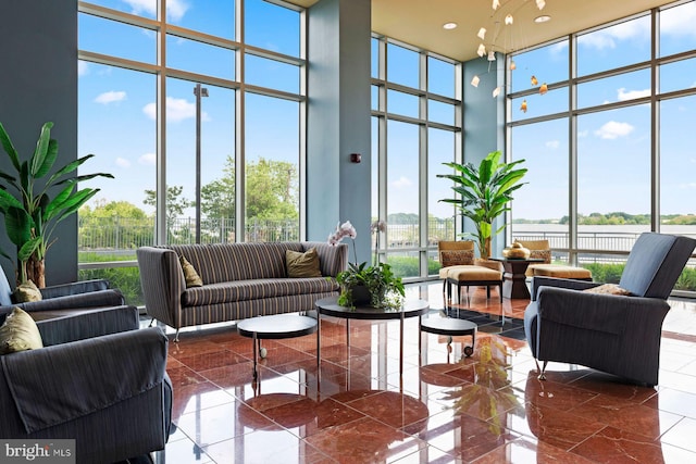 901 N Penn St Unit R305, Philadelphia, PA 19123 - lobby featuring a high ceiling, a wall of windows, and a water view
