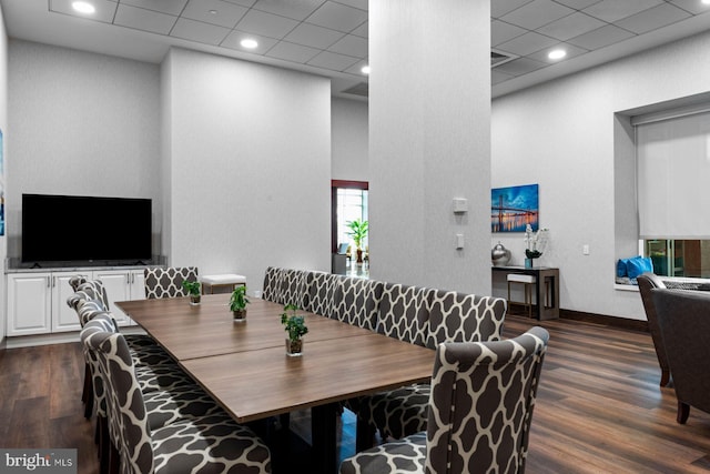 901 N Penn St Unit R305, Philadelphia, PA 19123 - dining area featuring dark wood-style floors, baseboards, a paneled ceiling, and recessed lighting