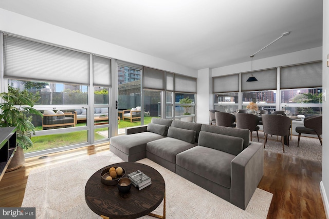901 N Penn St Unit R305, Philadelphia, PA 19123 - living room with wood finished floors and plenty of natural light