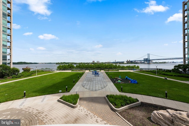901 N Penn St Unit R305, Philadelphia, PA 19123 - surrounding community featuring a water view and a yard