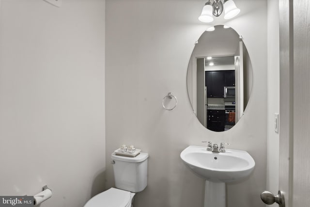 16894 Porters Inn Dr, Dumfries, VA 22026 - bathroom with toilet and a sink