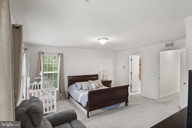 16894 Porters Inn Dr, Dumfries, VA 22026 - bedroom with light carpet and baseboards
