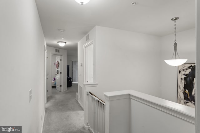 16894 Porters Inn Dr, Dumfries, VA 22026 - hall with an upstairs landing, light colored carpet, and baseboards