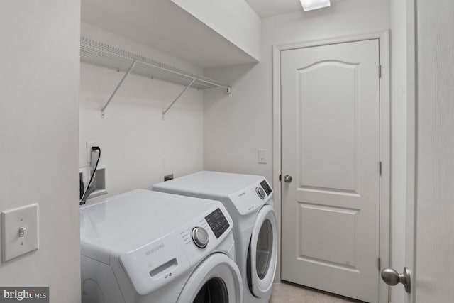 16894 Porters Inn Dr, Dumfries, VA 22026 - laundry room with washing machine and clothes dryer