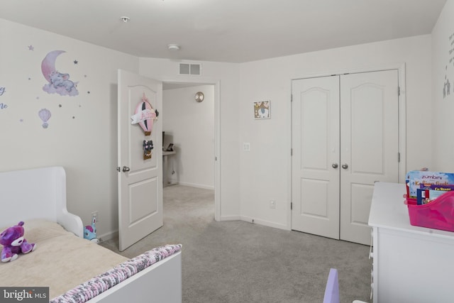 16894 Porters Inn Dr, Dumfries, VA 22026 - bedroom featuring light carpet, a closet, and baseboards