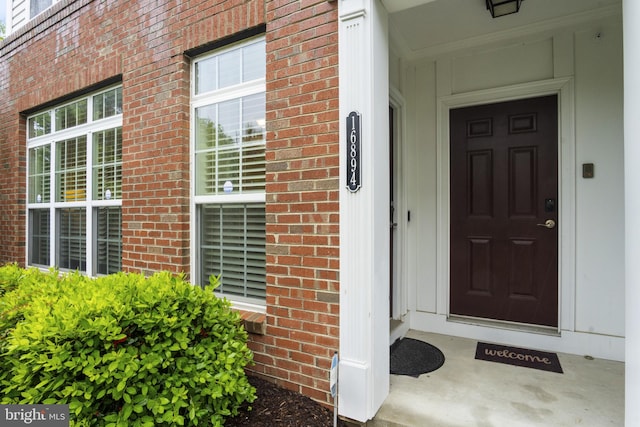 16894 Porters Inn Dr, Dumfries, VA 22026 - property entrance featuring brick siding