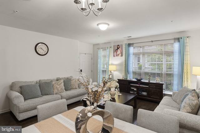 16894 Porters Inn Dr, Dumfries, VA 22026 - living area featuring dark wood finished floors and a chandelier