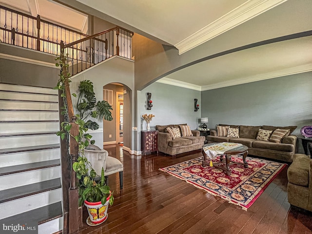 3348 Soaring Cir, Woodbridge, VA 22193 - living room with arched walkways, ornamental molding, wood-type flooring, stairway, and baseboards