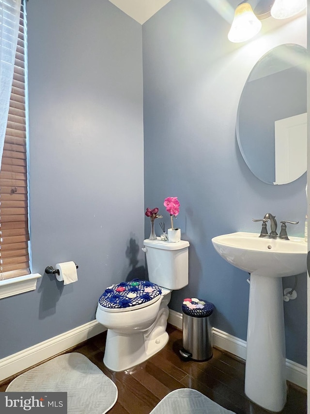 3348 Soaring Cir, Woodbridge, VA 22193 - bathroom featuring wood finished floors, toilet, and baseboards