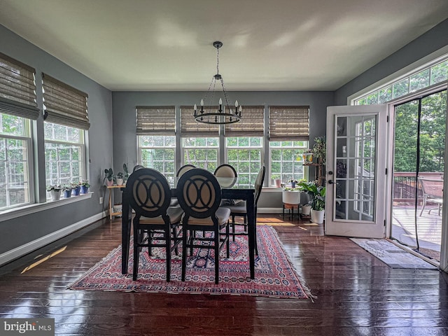 3348 Soaring Cir, Woodbridge, VA 22193 - dining room with healthy amount of natural light, a chandelier, and hardwood / wood-style floors