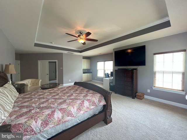 3348 Soaring Cir, Woodbridge, VA 22193 - bedroom featuring a tray ceiling, baseboards, light colored carpet, and ceiling fan