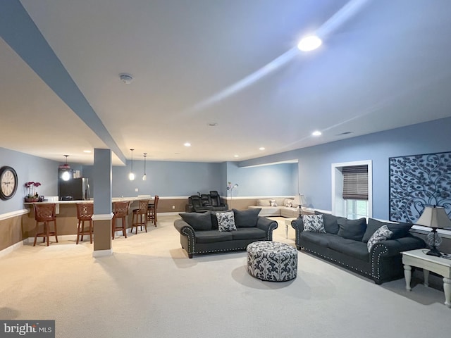 3348 Soaring Cir, Woodbridge, VA 22193 - living area with wet bar, light colored carpet, recessed lighting, and baseboards