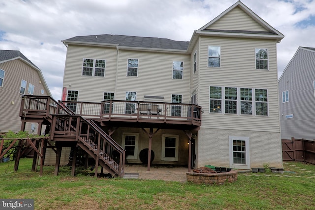 3348 Soaring Cir, Woodbridge, VA 22193 - back of property featuring a wooden deck, a fire pit, stairway, a patio, and brick siding