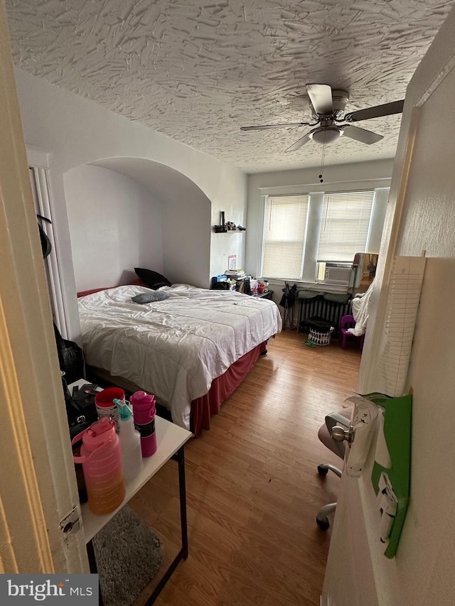 7420 Torresdale Ave, Philadelphia, PA 19136 - bedroom with wood finished floors, a textured ceiling, and a ceiling fan