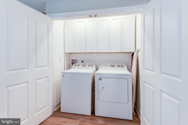 3 Canterbury Pl, Southampton, NJ 08088 - laundry area with independent washer and dryer, cabinet space, and light wood-style floors