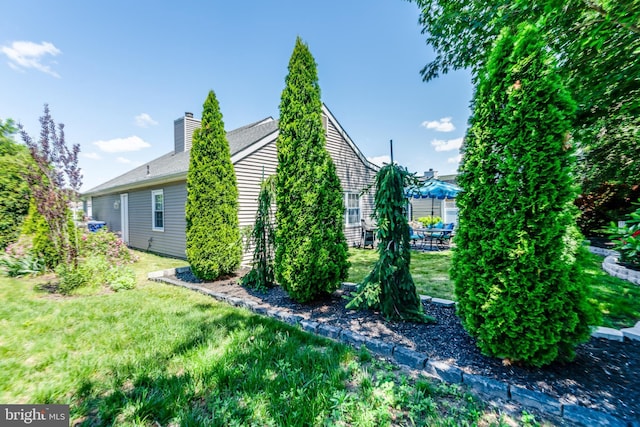 3 Canterbury Pl, Southampton, NJ 08088 - view of side of property featuring a yard and a chimney