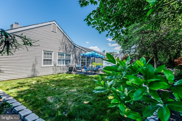3 Canterbury Pl, Southampton, NJ 08088 - view of green lawn with a patio area