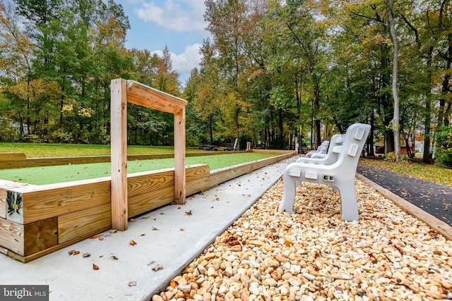 3 Canterbury Pl, Southampton, NJ 08088 - surrounding community featuring a bocce ball area and view of scattered trees