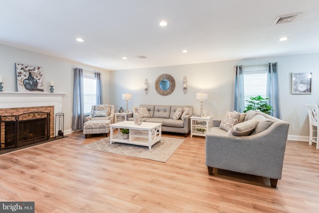 3 Canterbury Pl, Southampton, NJ 08088 - living room with light wood-style flooring, recessed lighting, baseboards, and a brick fireplace