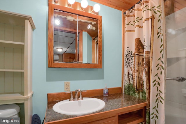 409 Julian St, Williamstown, PA 17098 - bathroom with vanity, toilet, and a shower with shower curtain