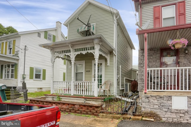 409 Julian St, Williamstown, PA 17098 - view of front of home with covered porch and stone siding
