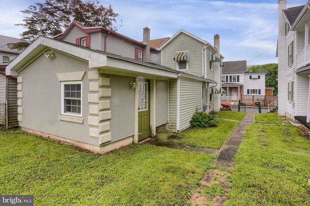 409 Julian St, Williamstown, PA 17098 - back of house featuring a chimney