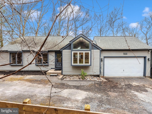 6518 Rimrock Rd, New Market, MD 21774 - view of front of property featuring a garage, roof with shingles, and dirt driveway
