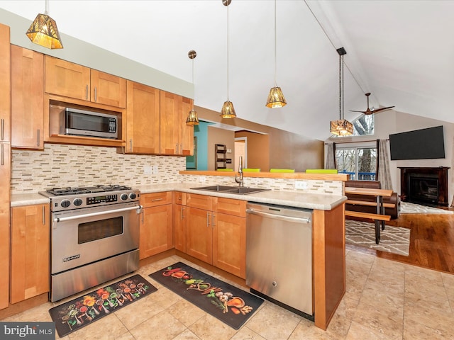 6518 Rimrock Rd, New Market, MD 21774 - kitchen with stainless steel appliances, a sink, backsplash, a ceiling fan, and open floor plan
