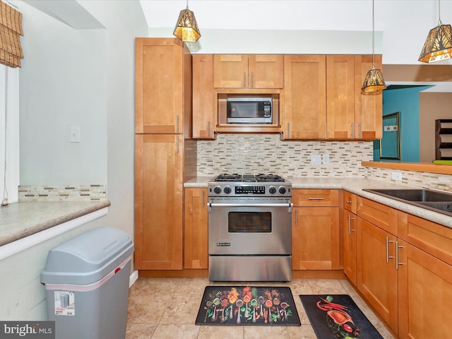 6518 Rimrock Rd, New Market, MD 21774 - kitchen featuring stainless steel appliances, backsplash, light countertops, and pendant lighting